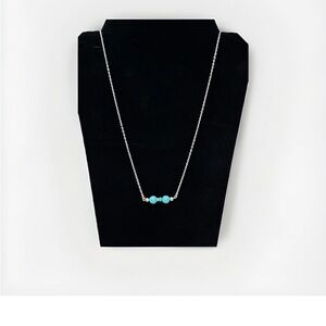 Turquoise Color Beaded Necklace Silver plated chain with blue beads.